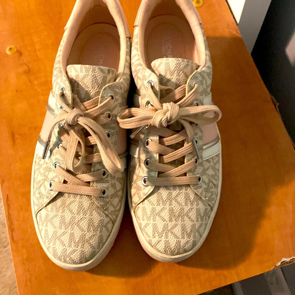 Nice paid of Michael Kors pink and cream sneakers!  Size 6 women’s.